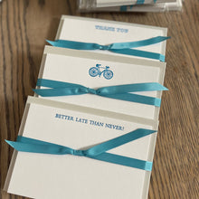 Three sets of cards, Thank you, Racing bike and Better Late Than Never, all printed in neon blue ink